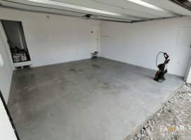 Szlifowanie i impregnacja betonowej wylewki w dużym garażu 